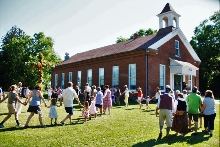 Dancing around the Maypole at the Bishop Hill Midsommar Music Festival.