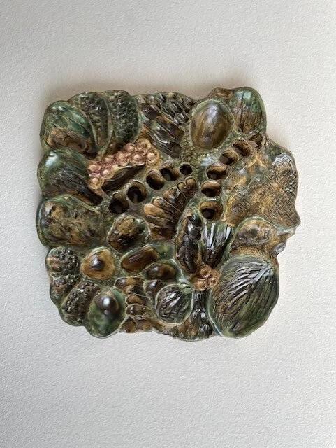 Laura Vincent-Arnold's "Wall Relief 12" at the Quad City Arts International Airport Gallery -- July 3 through August 26.