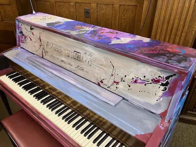 A "Keys of Unity" piano painted by Regan Hatfield