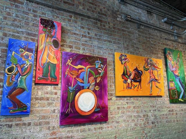 Vavrosky's series of five musician paintings (photo by Jonathan Turner)