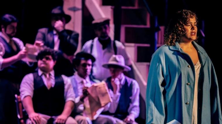 Harmoni Eiland and ensemble members in Evita
