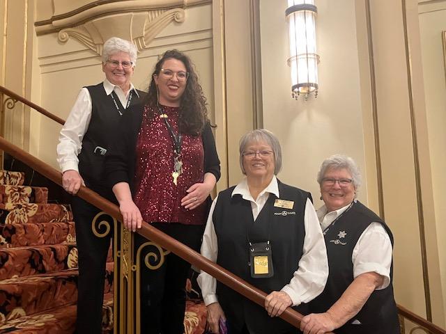Pictured in the Adler lobby on January 15 are Jan Schweer, Chandler Cox, Linda Vandeventer, and Bev Rosenbohm (photo by Jonathan Turner).