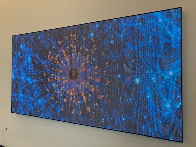 Leo Villareal's "Cosmic Bloom," an LED art display, in the Figge lobby.