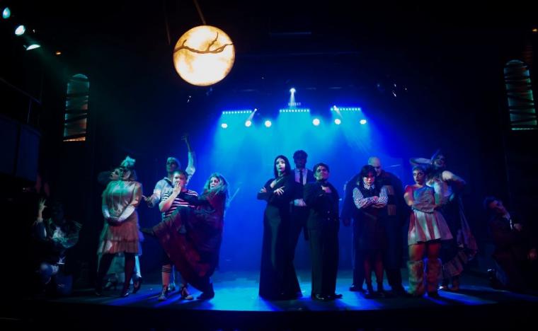 The Addams Family ensemble members