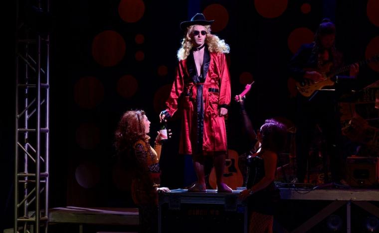Mikey Marmann and ensemble members in Rock of Ages (photo by Amy May Photography)