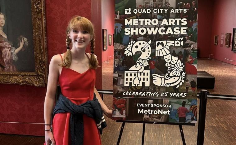 Eden Myers of Andalusia (who worked on Metro Arts projects all four years of high school) at the program showcase, July 15, 2025 at the Figge Art Museum (photo by Missy Myers, Capturing Fireflies Photography).