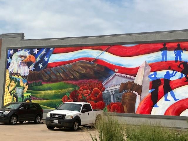 A Metro Arts mural completed in summer 2024 in downtown Rock Island, 4th Avenue and 19th Street (photo by Jonathan Turner).
