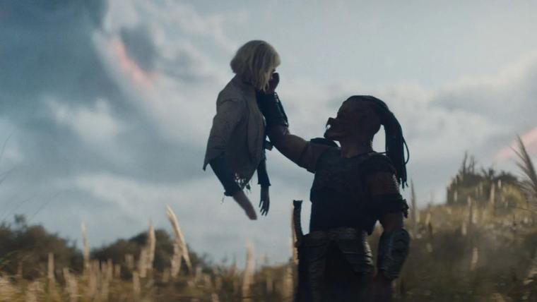 Elle Fanning and Dimitrius Schuster-Koloamatangi in Predator: Badlands