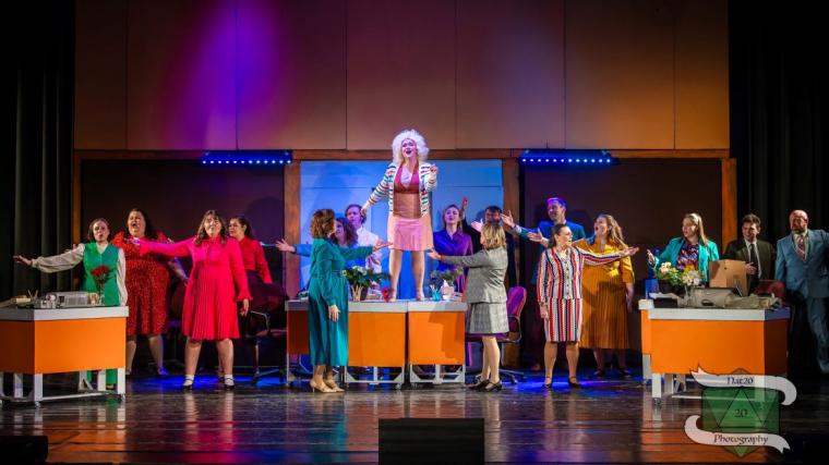 Katie Griswold and ensemble members in 9 to 5: The Musical  (photo by Nat20 Photography)