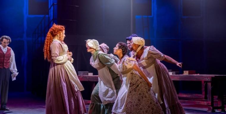 Jose-Emilio Escoto, Channing Weir, and ensemble members in Les Misérables