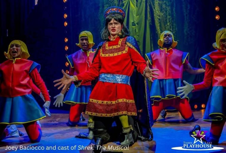 Joey Baciocco and ensemble members in Shrek the Musical