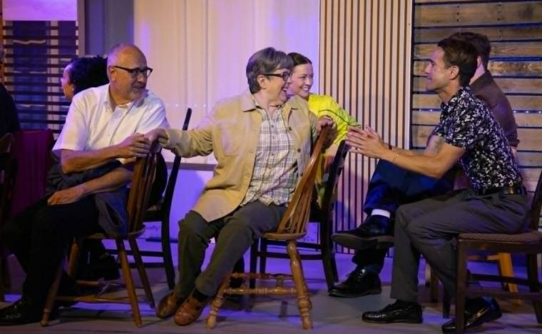 Doug Kutzli, Karen LeFebvre, Tommy Ratkiewicz, and ensemble members in Come from Away